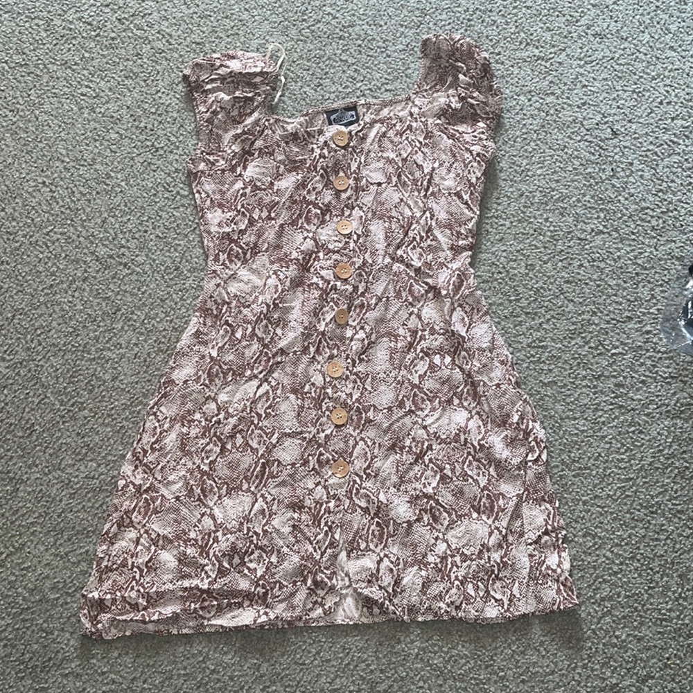 I am selling a snake button up maxi dress.